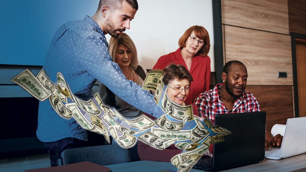 Group of people around a computer that is spewing dollar bills