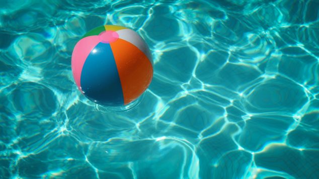 beach ball floating in pool