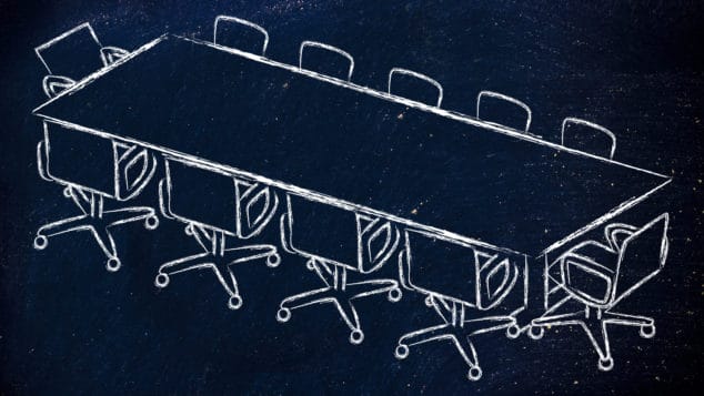A chalk drawing on a blackboard of a board table and chairs / governance