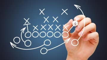Event Strategy Concept: Coach Drawing American Football Game Playbook