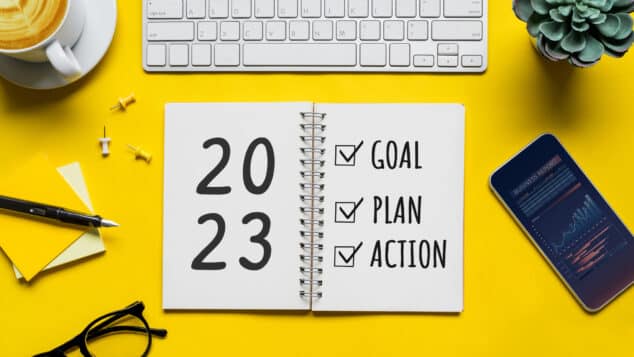 2023 new year goal,plan,action concepts with text on notepad and office accessories.Business management,Inspiration to success ideas